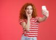 https://pixabay.com/photos/girl-woman-female-ginger-red-6920625/ Woman smiling for a selfie